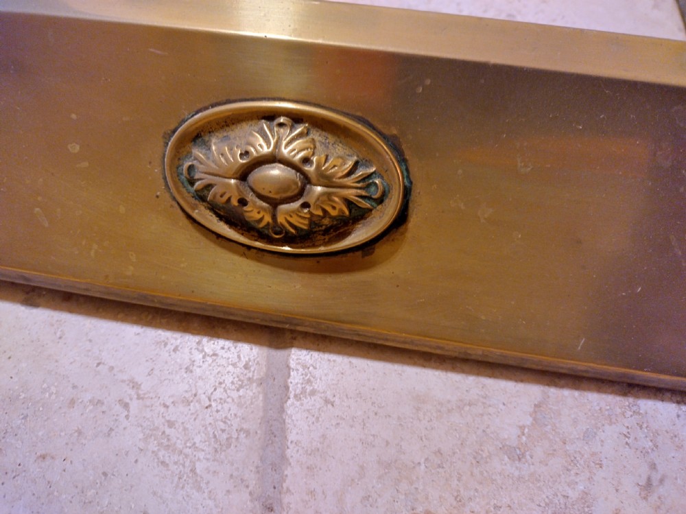 Brass Fender early 1900s in tidy condition. View V