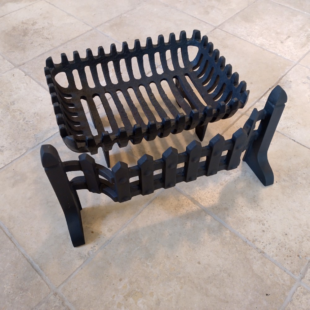 Cast fire basket shaped grate with cast fire front