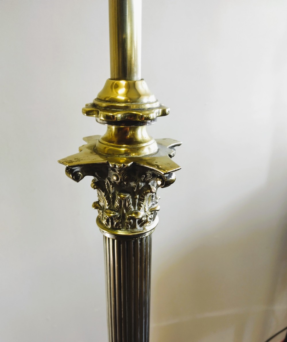 A solid brass Neoclassical standard lamp featuring a fluted column shaft, stepped square base on paw feet, and a tall cream fabric shade. View III