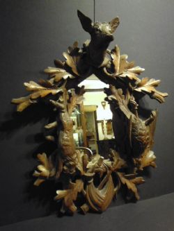 19TH CENTURY BLACK FOREST CARVED WALNUT MIRROR