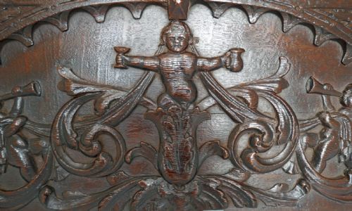 ANTIQUE 17THC OAK CARVED PANEL SHOWING THE GREEN MAN FLANKED BY HORN BLOWING PUTTI FLEMISH C166080 - ADDITIONAL PHOTO 1