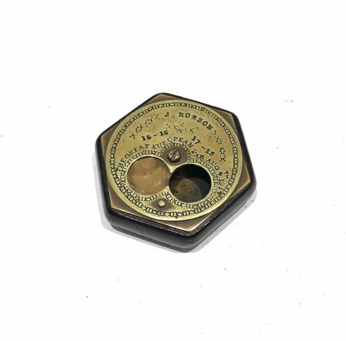 fig 1. An early twentieth-century hexagonal brass miser snuff box with engraved text including J Robson and The Great European War Aug 4th 1914.
