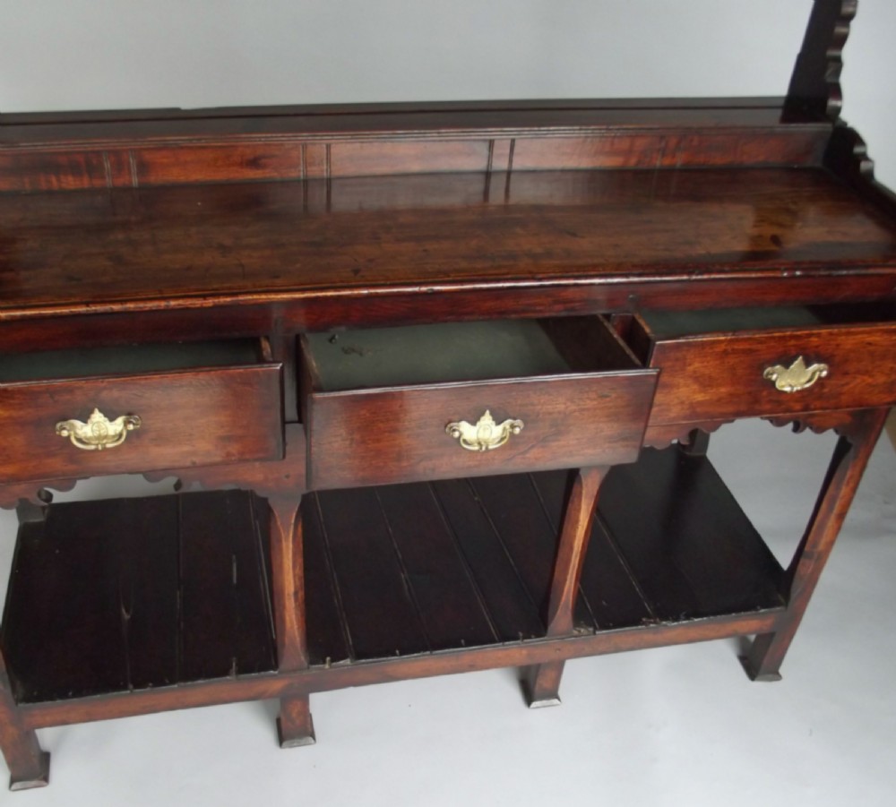A small 18thc Furniture Oak & Ash Potboard Dresser with original rack .   Welsh C1780-90.
 View V