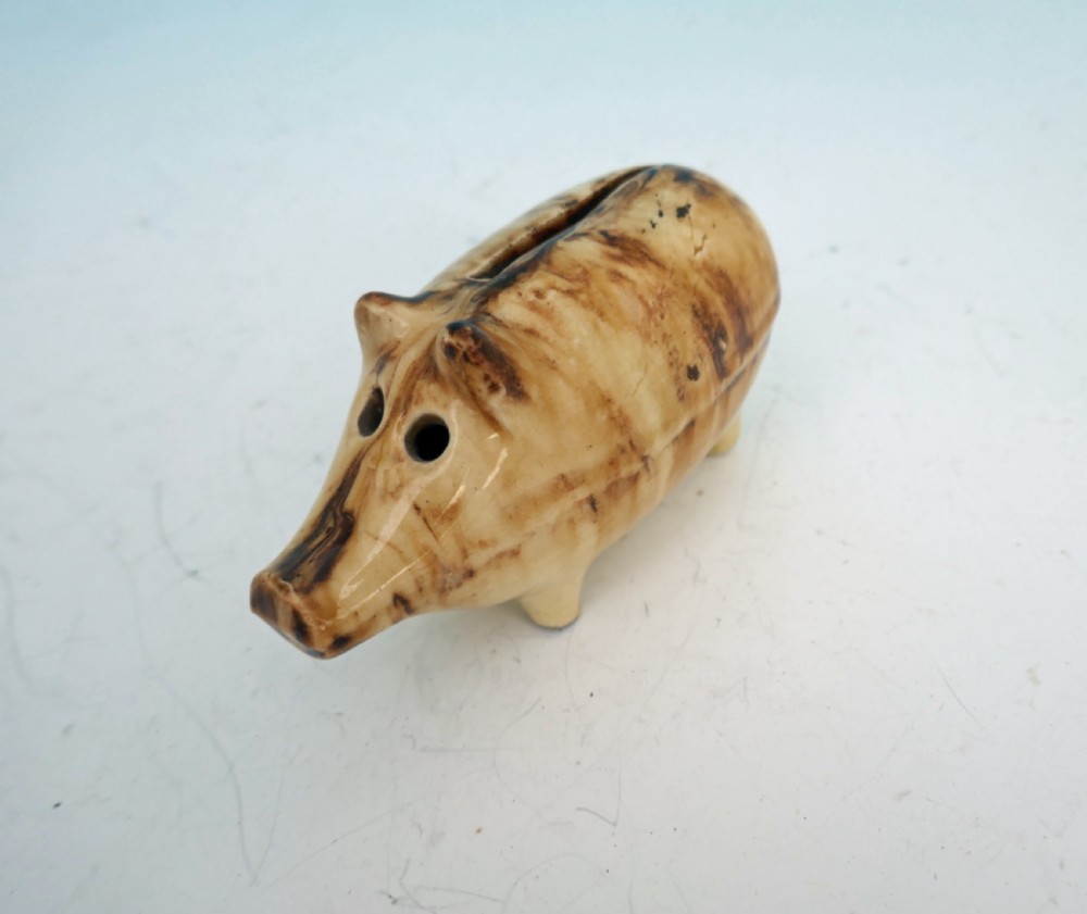 Antique Pottery 19thc Slip Glazed Money Box In The Form Of A Pig.