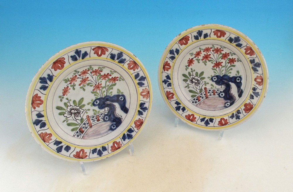 A Fine Pair Of 18thc Polychrome Pottery Delftware Plates.     Dutch. C1770-80