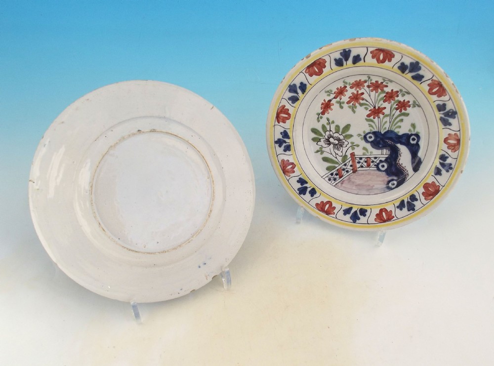A Fine Pair Of 18thc Polychrome Pottery Delftware Plates.     Dutch. C1770-80 View III