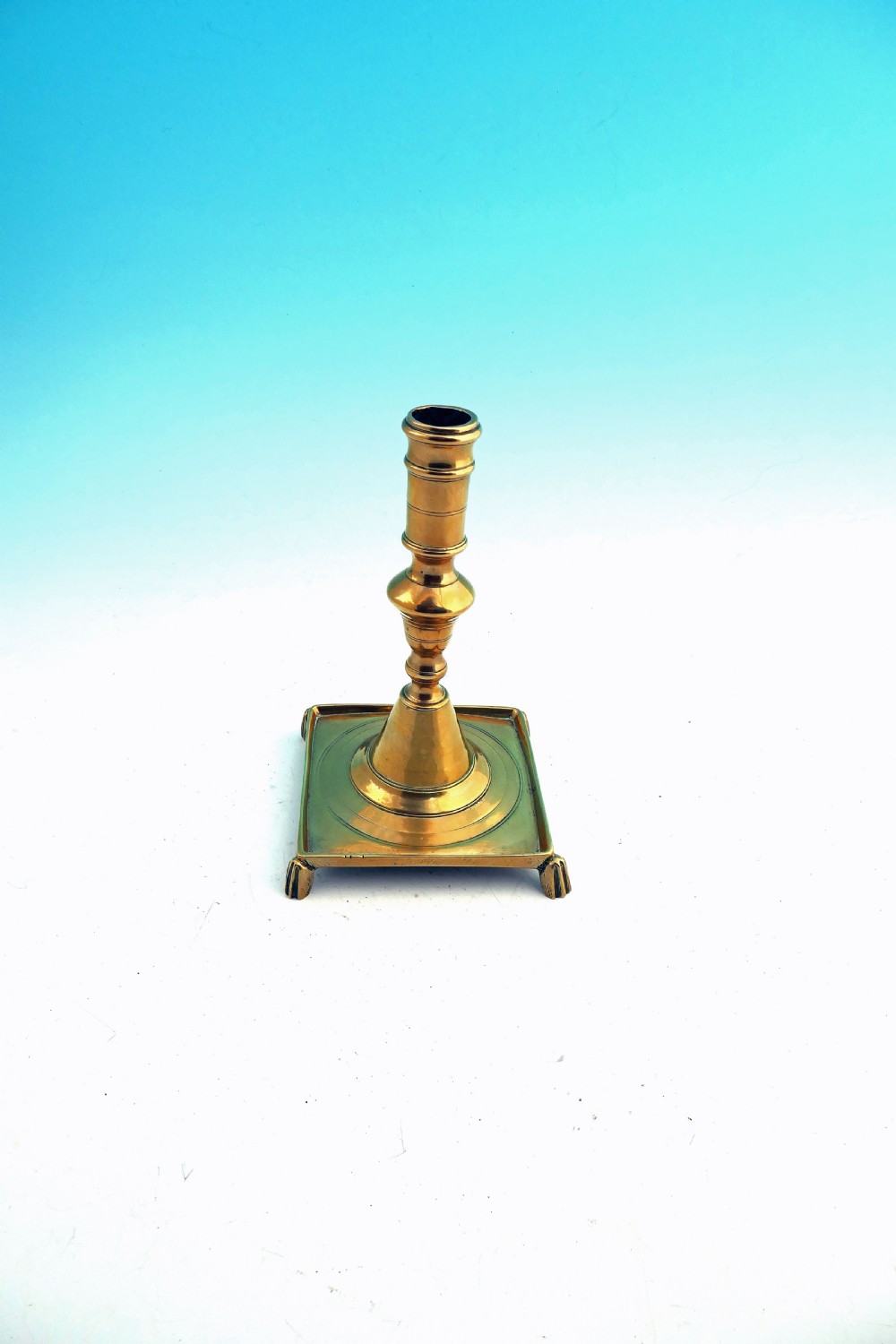 Antique Metalware 17thc Brass Square Based Candlestick.    Spanish C1680-C1700