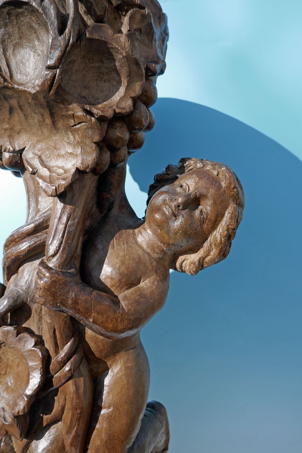 17thc Limewood Carving Of A Cherub Amongst The Grapevines.    Continental  C1670-90 View II