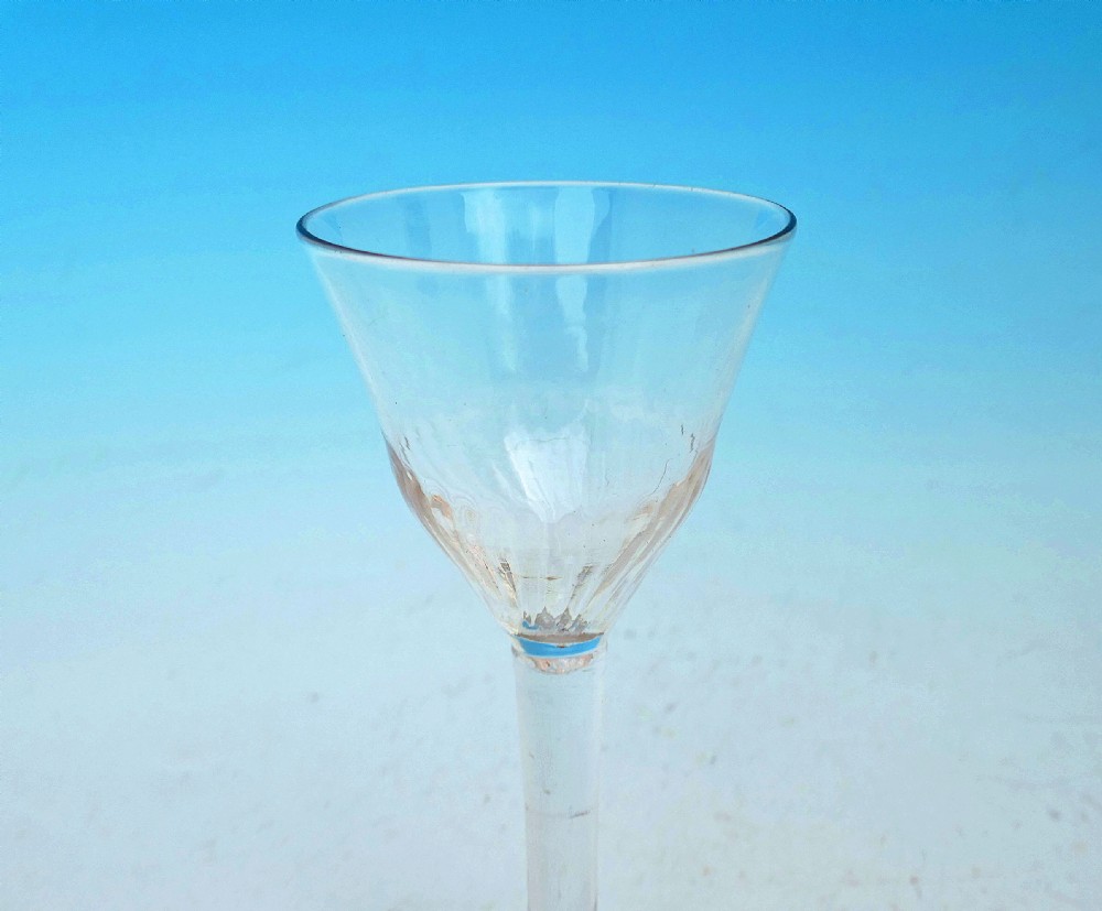 Early 18thc Wine Glass With Basal Fluted Bowl And Folded Foot.    English C1740-60 View II