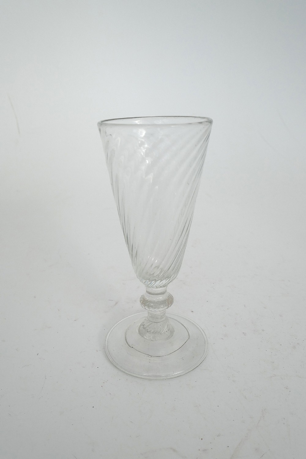 Early 18thc Wrythen Folded Foot Ale Drinking Glass .   English C1730-40.