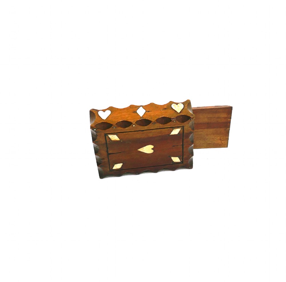 An antique nineteenth-century rectangular fruitwood snuff box featuring scalloped carved borders and inlaid bone heart and diamond shapes. View IV
