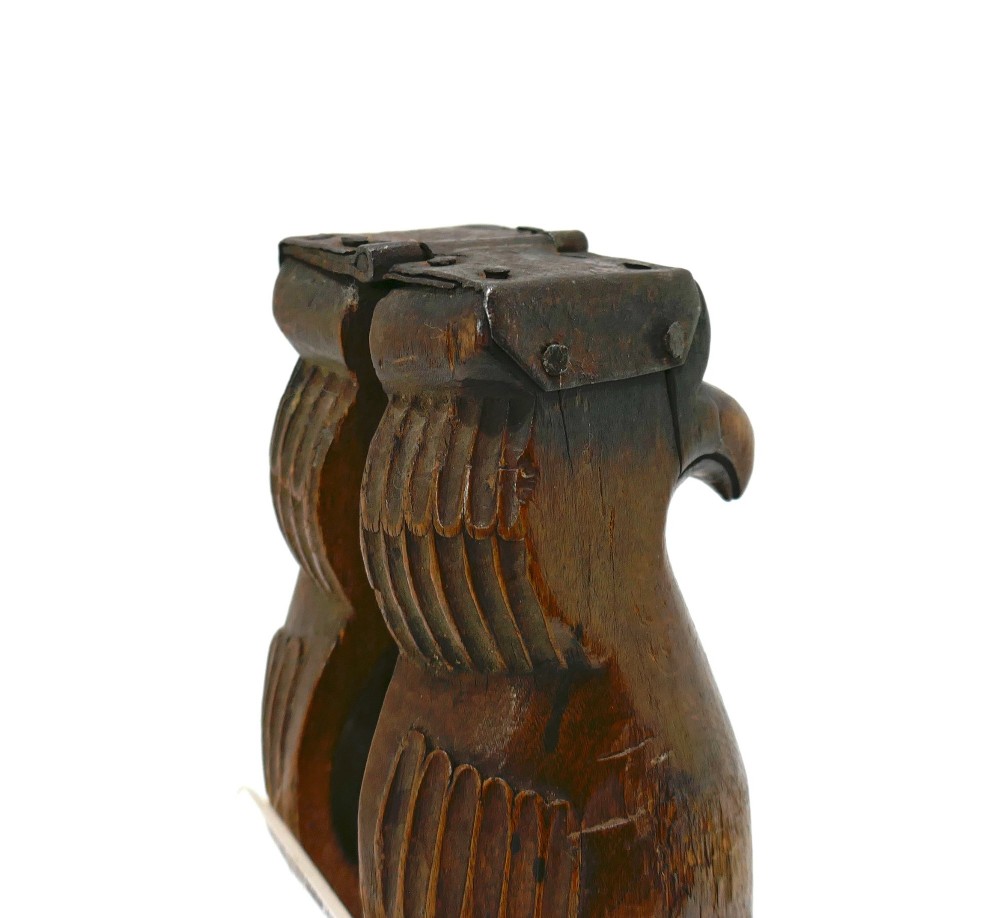 A 19th-century carved sycamore lemon squeezer shaped as two falcon heads with a hinged top and dark wood patina. View III