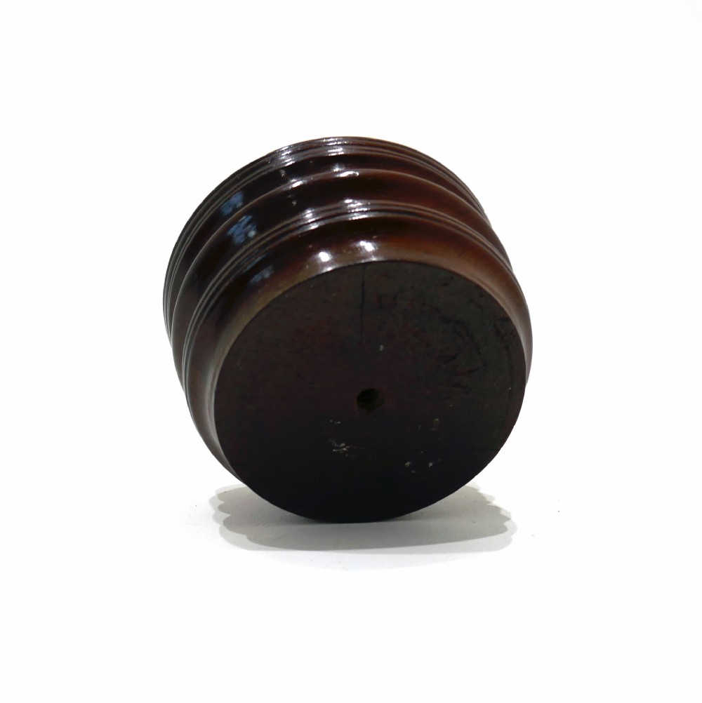 An antique late 18th-century turned laburnum wood open salt cellar featuring a ribbed exterior and a rich dark brown polished finish. View IV