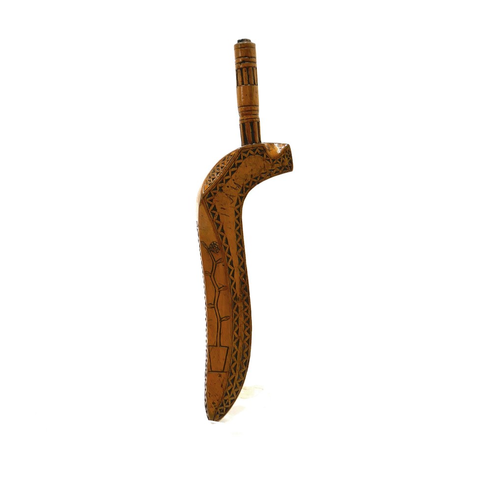 A 19th-century Cumbrian fruitwood goosewing knitting sheath featuring intricate chip-carved and punchwork geometric decoration alongside a turned terminal.
