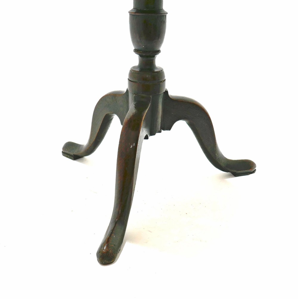 An 18th-century English Georgian tripod table featuring a circular tilt top supported by a turned baluster stem and three curved cabriole legs. View II