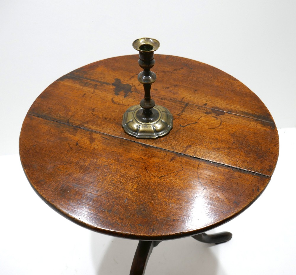 An 18th-century English Georgian tripod table featuring a circular tilt top supported by a turned baluster stem and three curved cabriole legs. View III