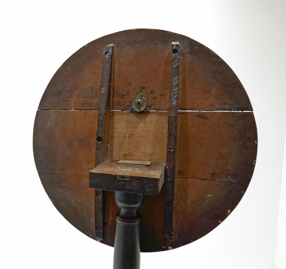 An 18th-century English Georgian tripod table featuring a circular tilt top supported by a turned baluster stem and three curved cabriole legs. View IV