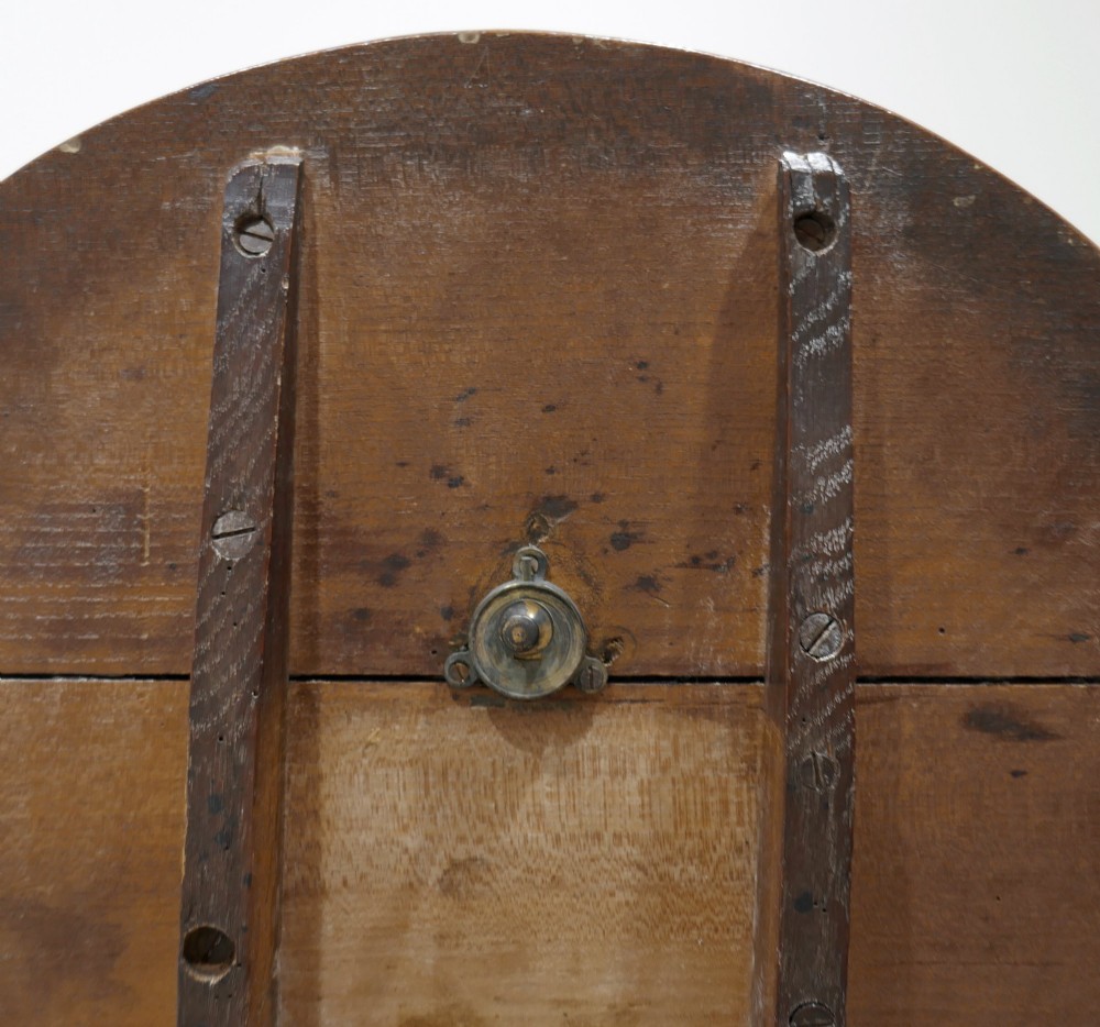 An 18th-century English Georgian tripod table featuring a circular tilt top supported by a turned baluster stem and three curved cabriole legs. View V
