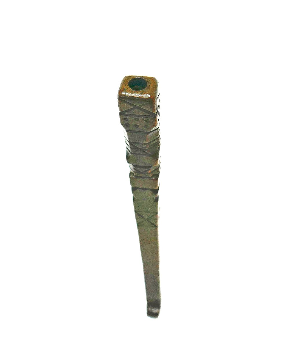 A slender nineteenth-century carved fruitwood knitting sheath featuring geometric incised lines and punchwork decoration. View IV