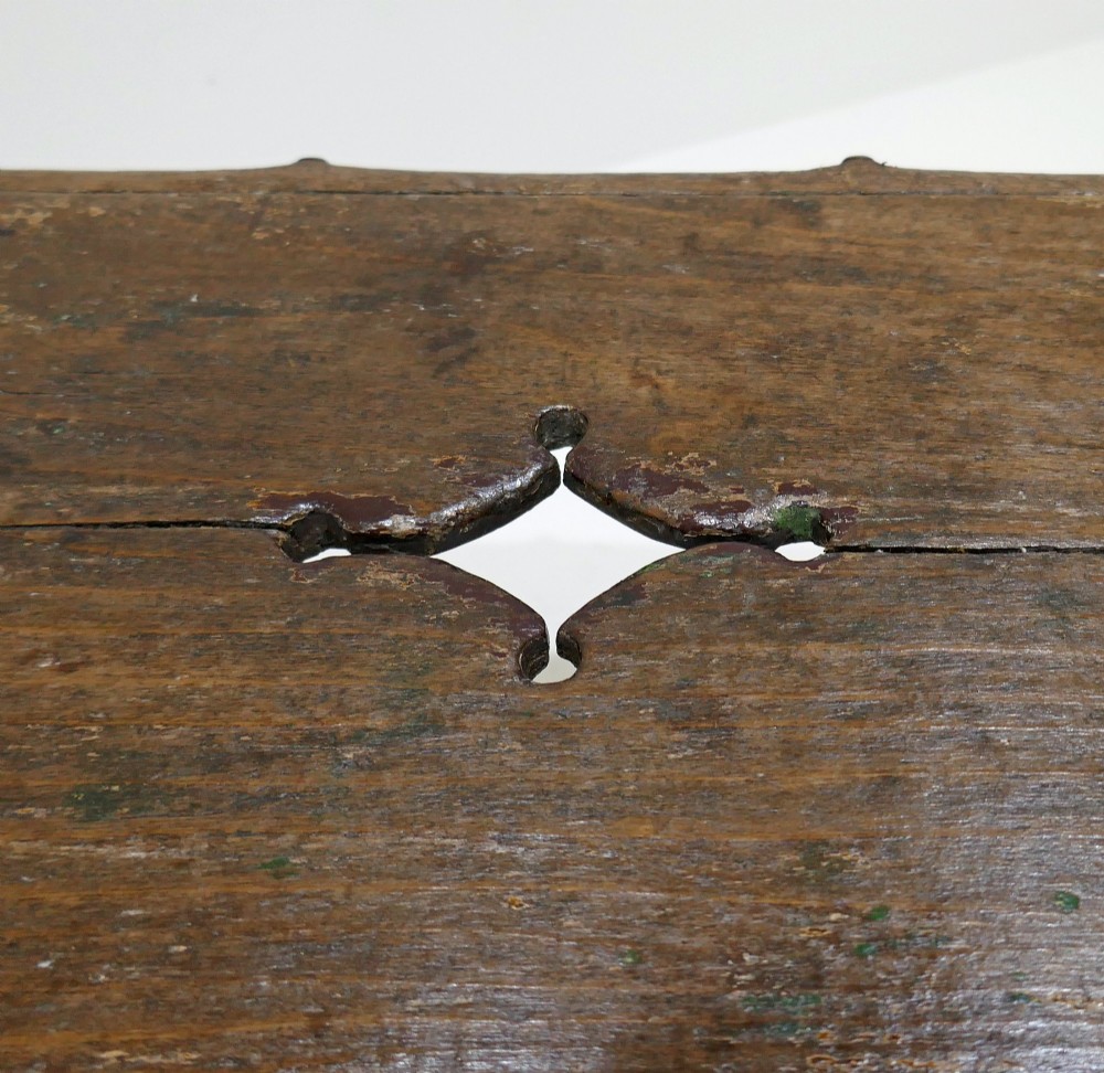 A 19th-century dark pine Scottish creepie stool featuring scalloped aprons and cut-out slab legs. View IV