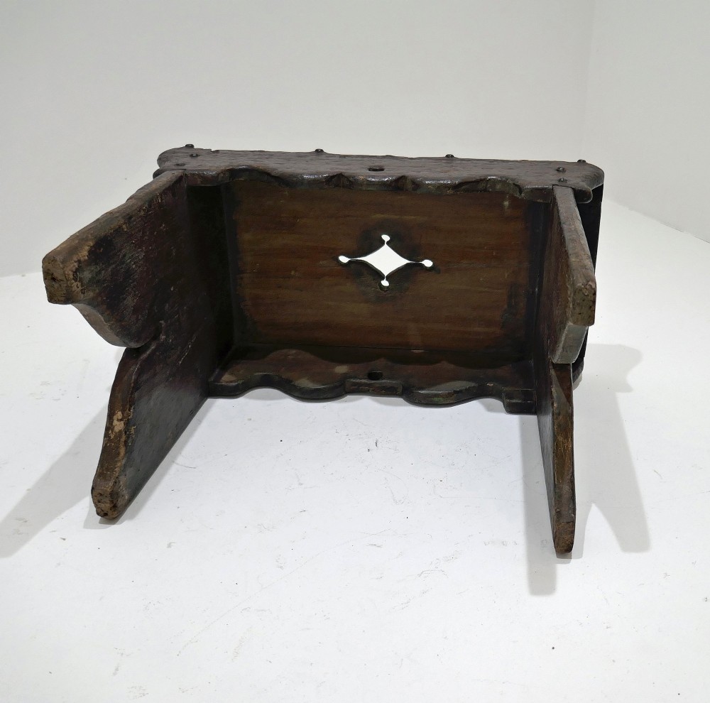 A 19th-century dark pine Scottish creepie stool featuring scalloped aprons and cut-out slab legs. View V