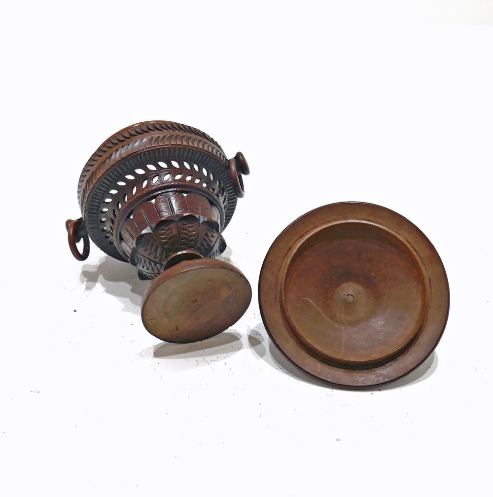 An early 19th-century turned fruitwood lidded pomander cup featuring a finial top, spiralled fluting, carved ring handles, and a pedestal base. View III