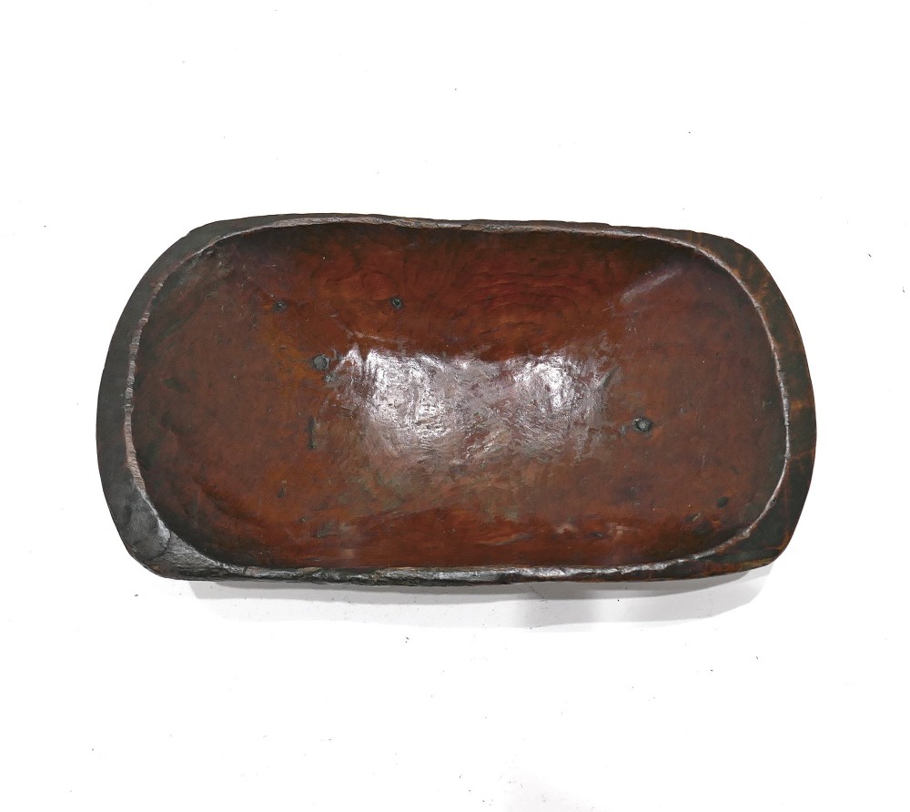 A hand-carved rectangular 19th-century pine dough bowl with an adzed interior and a warm brown patinated finish. View III