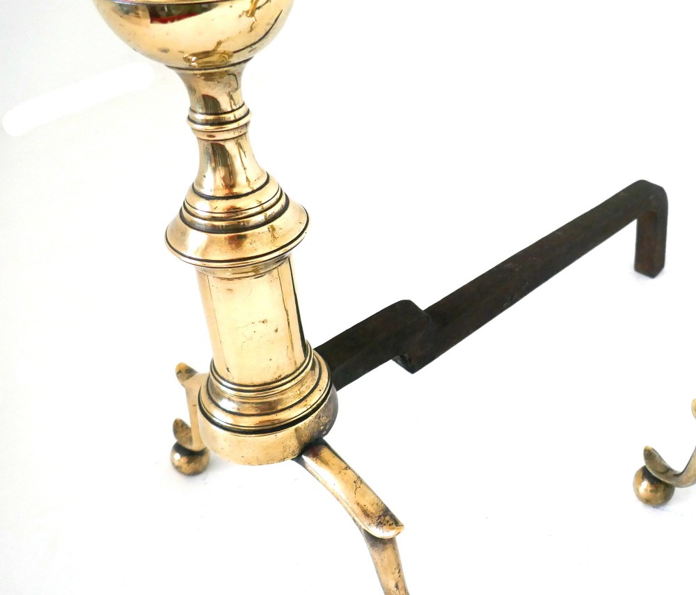 A pair of late eighteenth-century brass and irons featuring turned urn finials, spurred legs, and ball feet attached to wrought iron billets. View IV