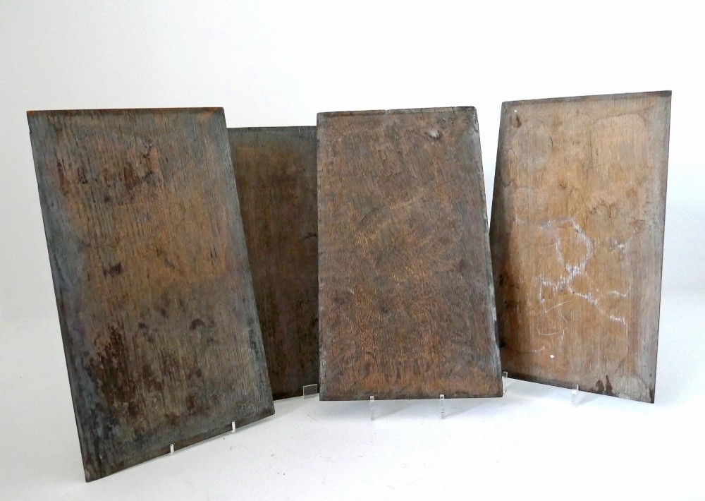 A set of four dark oak rectangular panels featuring hand-carved vertical linenfold drapery design. View IV