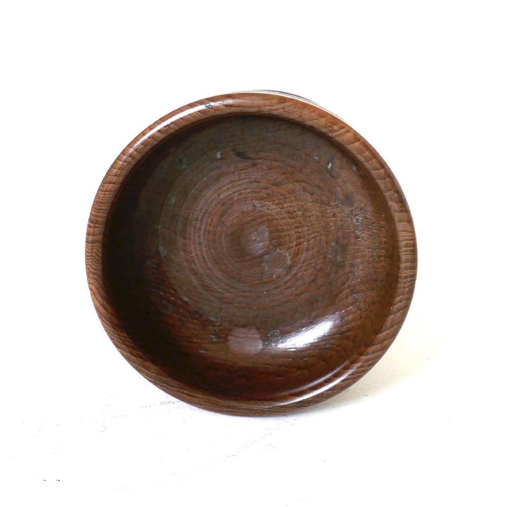 An 18th-century turned yew wood salt cellar featuring a bowl-shaped top set on a short pedestal stem and circular stepped base. View III
