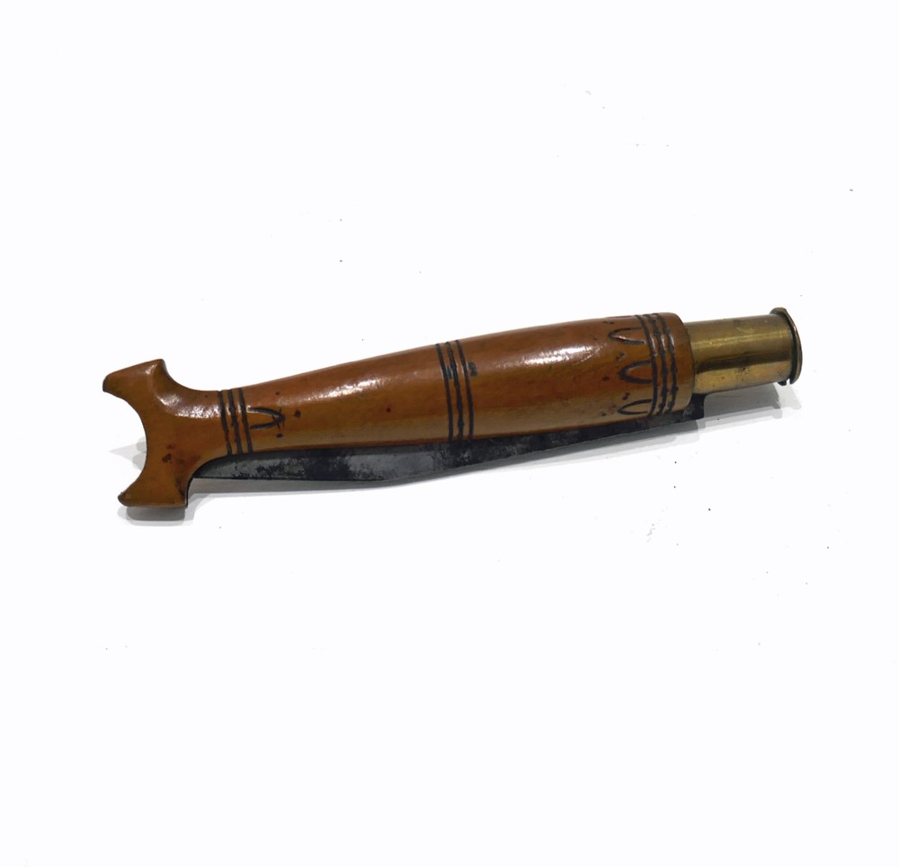 A nineteenth-century French folding penknife carved from fruitwood in the shape of a fish with a brass collar and steel blade.