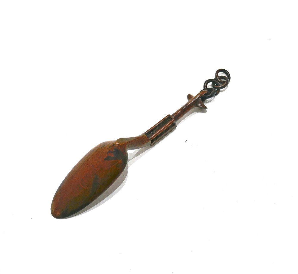A carved fruitwood Welsh love spoon featuring an oval bowl, a framed name panel inscribed Ann Jones along the handle, and carved wooden chain links at the terminal. View II