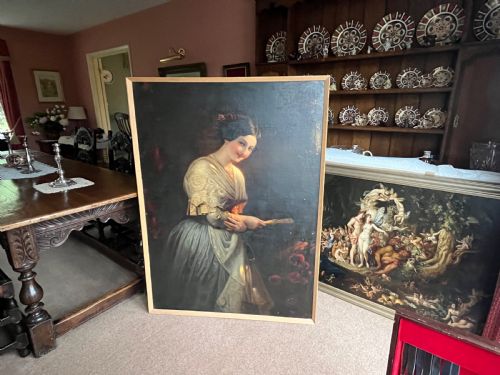 fig 1. A nineteenth-century oil painting on canvas depicting a smiling woman in a lace shawl holding a fan against a dark background.