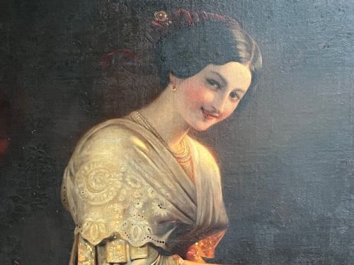 fig 2. A nineteenth-century oil painting on canvas depicting a smiling woman in a lace shawl holding a fan against a dark background.