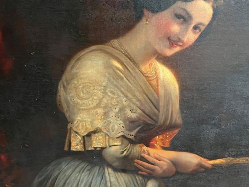 fig 3. A nineteenth-century oil painting on canvas depicting a smiling woman in a lace shawl holding a fan against a dark background.