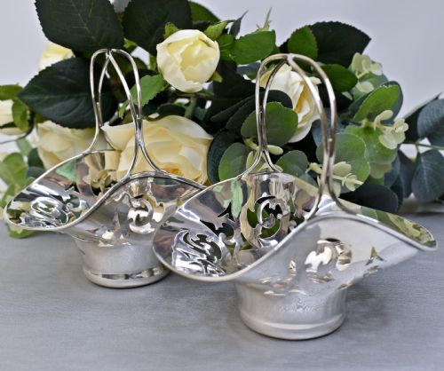 PAIR OF ENGLISH STERLING SILVER PIERCED BON BON BASKETS FENTON BROTHERS SHEFFIELD 1929
