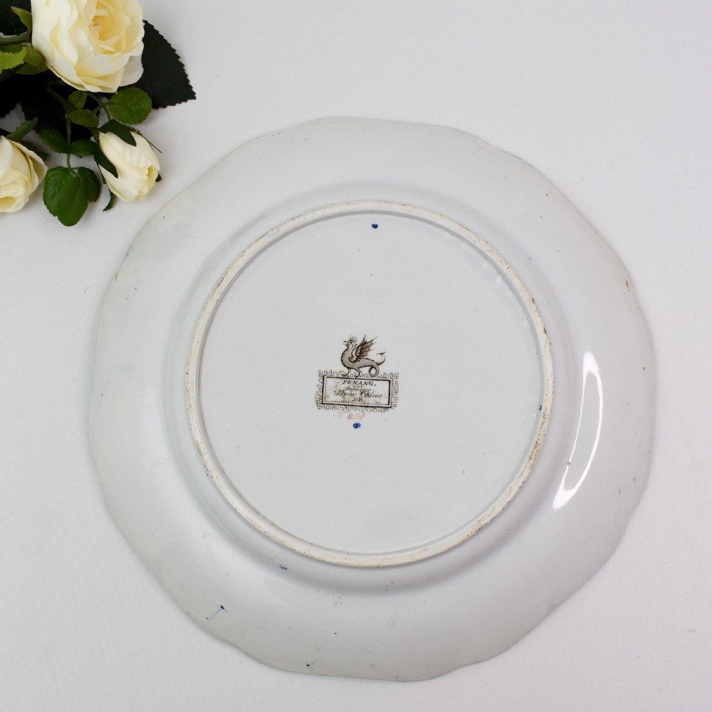An octagonal Victorian stoneware plate by John Ridgway featuring an intricate Penang pattern with Chinoiserie pagodas, floral urns, cobalt blue borders, and gilded accents. View VI