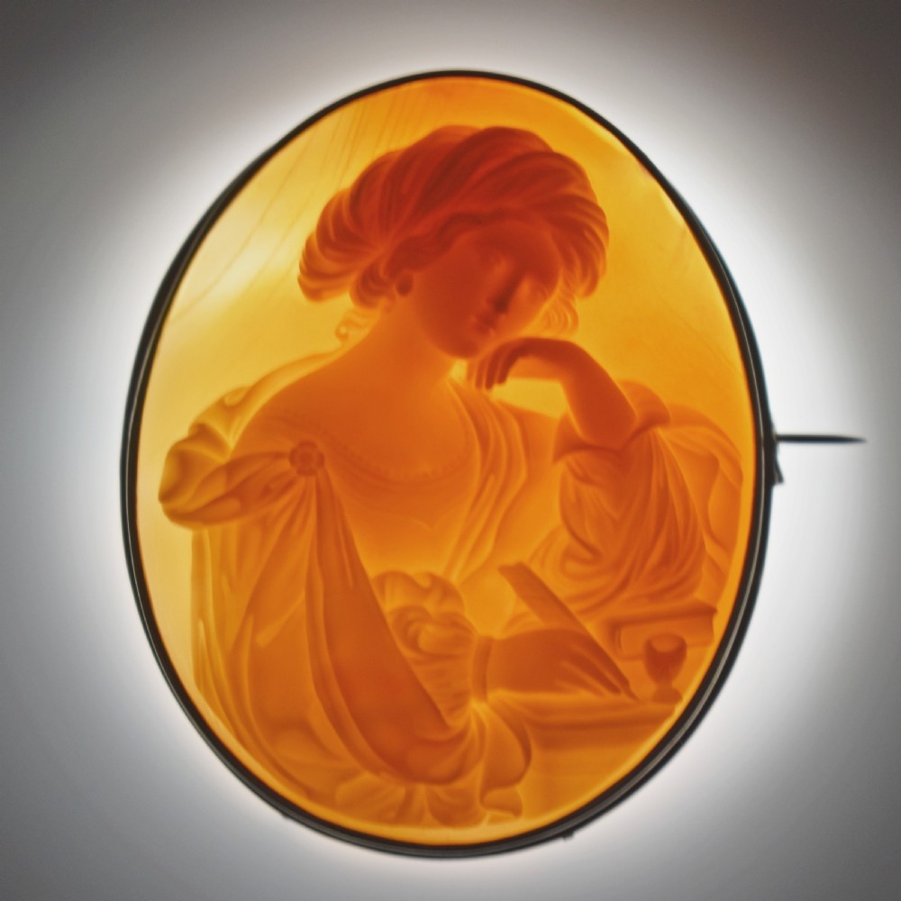 A mid-19th century oval shell cameo brooch set in a 9ct gold frame, depicting the Persian Sibyl after Guercino in relief. View III