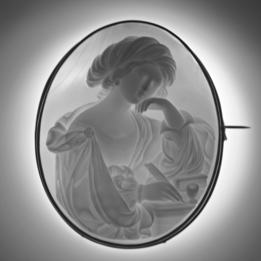 A mid-19th century oval shell cameo brooch set in a 9ct gold frame, depicting the Persian Sibyl after Guercino in relief. View XIII