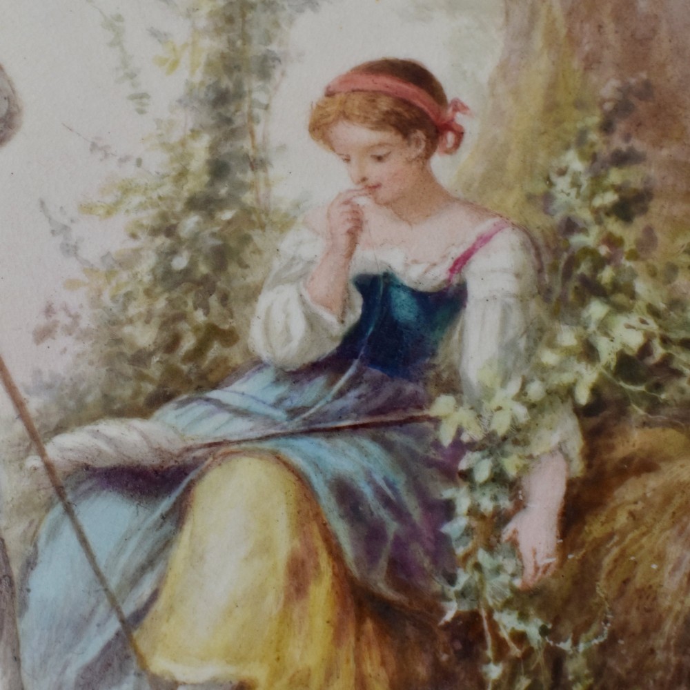 A circular Victorian porcelain cabinet plate featuring a hand-painted romantic pastoral scene enclosed by a lobed rim decorated with gold gilding. View IV