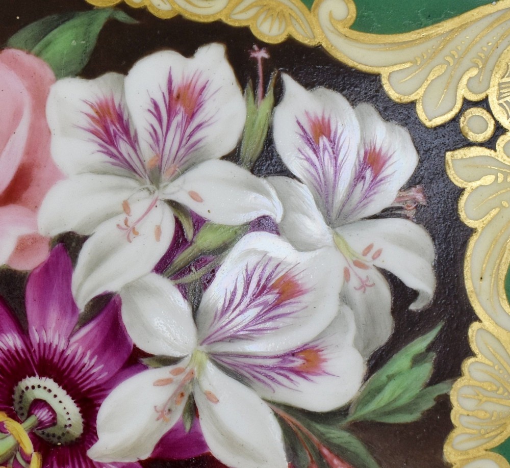 A rectangular green porcelain tray with elaborate gold scrollwork framing a hand-painted botanical bouquet in the centre. View III