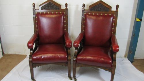 PAIR OF LEATHER MONUMENTAL LIBRARY ARMCHAIRS