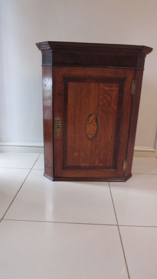georgian oak and mahogany corner cupboard - CATEGORY: ANTIQUE CUPBOARDS - DATED GEORGIAN