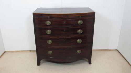 elegant small bow front chest with a brushing slide - CATEGORY: ANTIQUE CHEST OF DRAWERS - DATED 18TH CENTURY