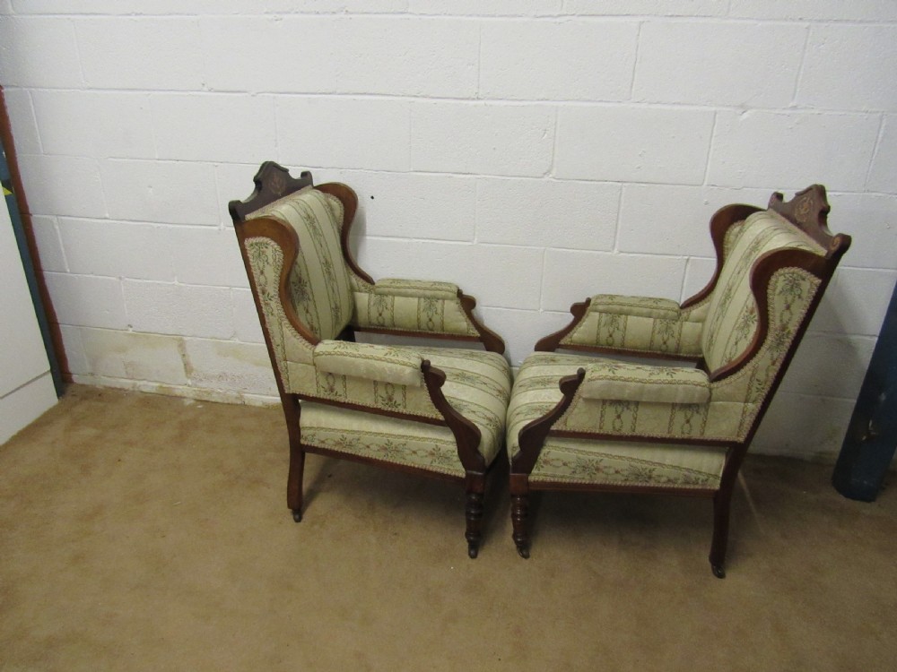 pair upholstered arm chairs View V