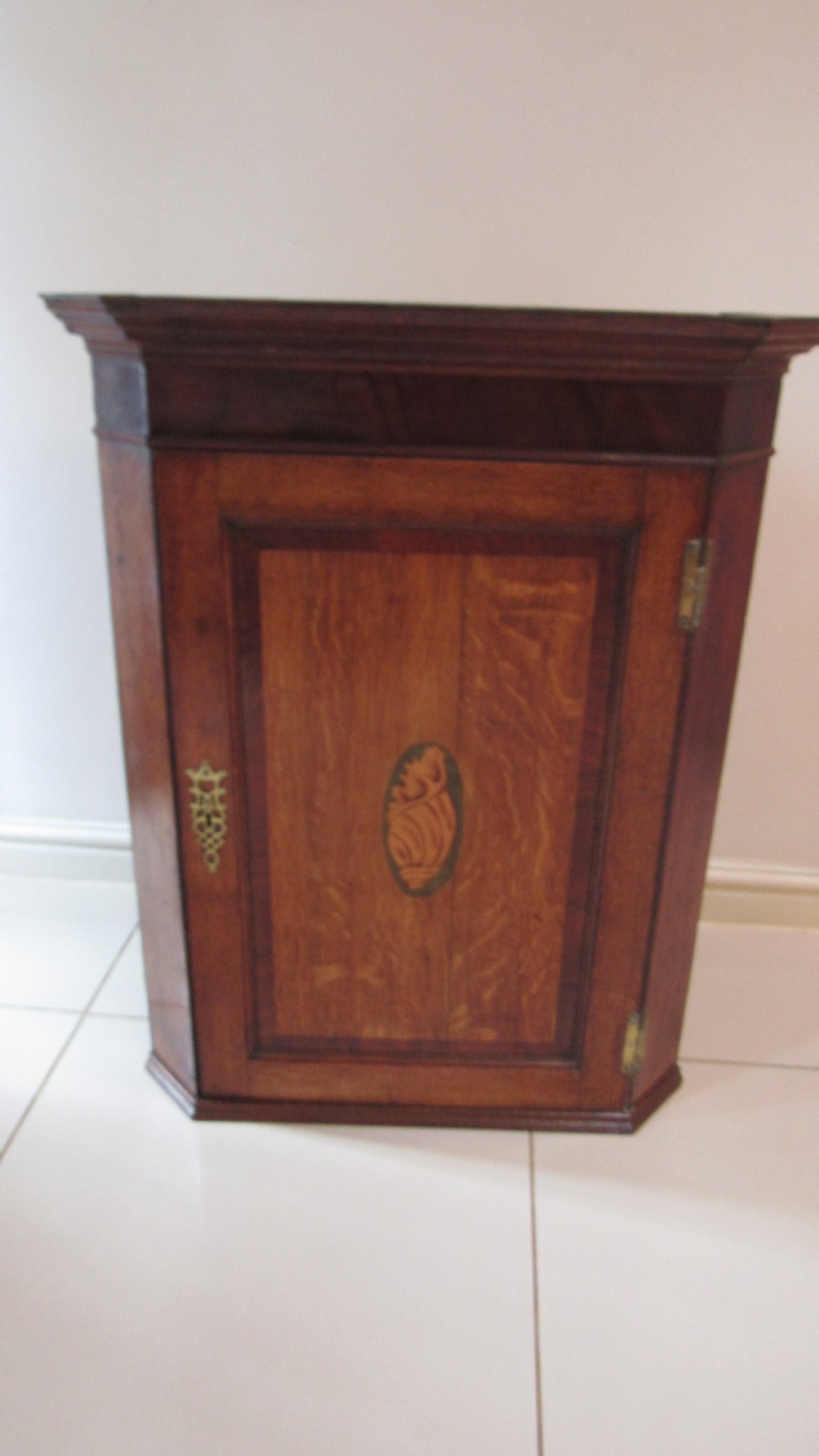 Georgian oak and mahogany corner cupboard View II
