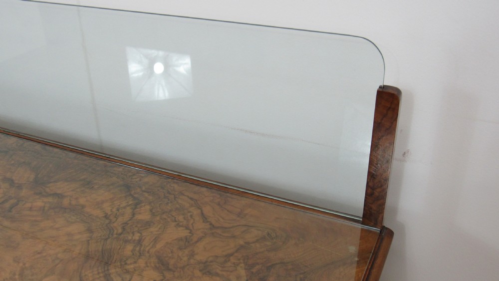 An antique burr walnut side table featuring cabriole legs with claw and ball feet, a single drawer, and a fitted glass top insert. View VIII