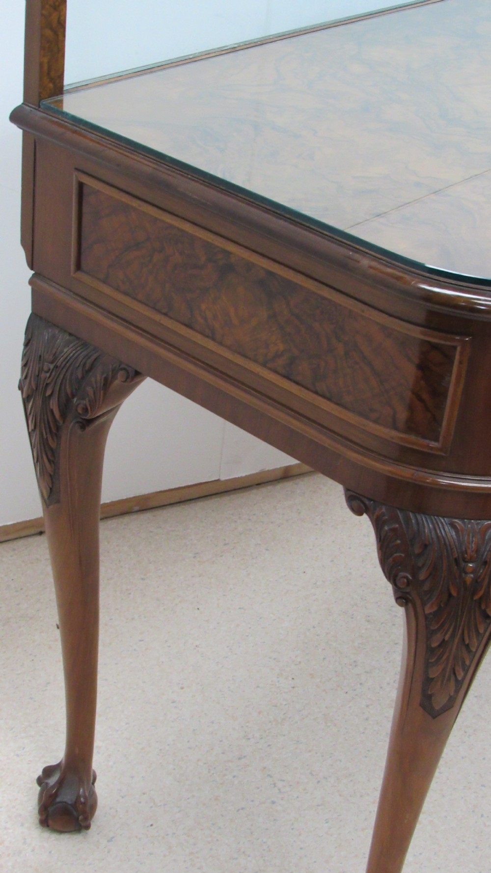 An antique burr walnut side table featuring cabriole legs with claw and ball feet, a single drawer, and a fitted glass top insert. View XI