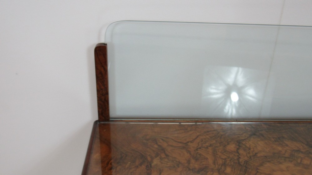 An antique burr walnut side table featuring cabriole legs with claw and ball feet, a single drawer, and a fitted glass top insert. View XIV