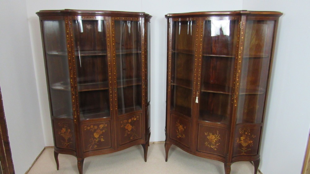Wonderful Edwardian pair of serpentine  inlaid display cabinets  View XI